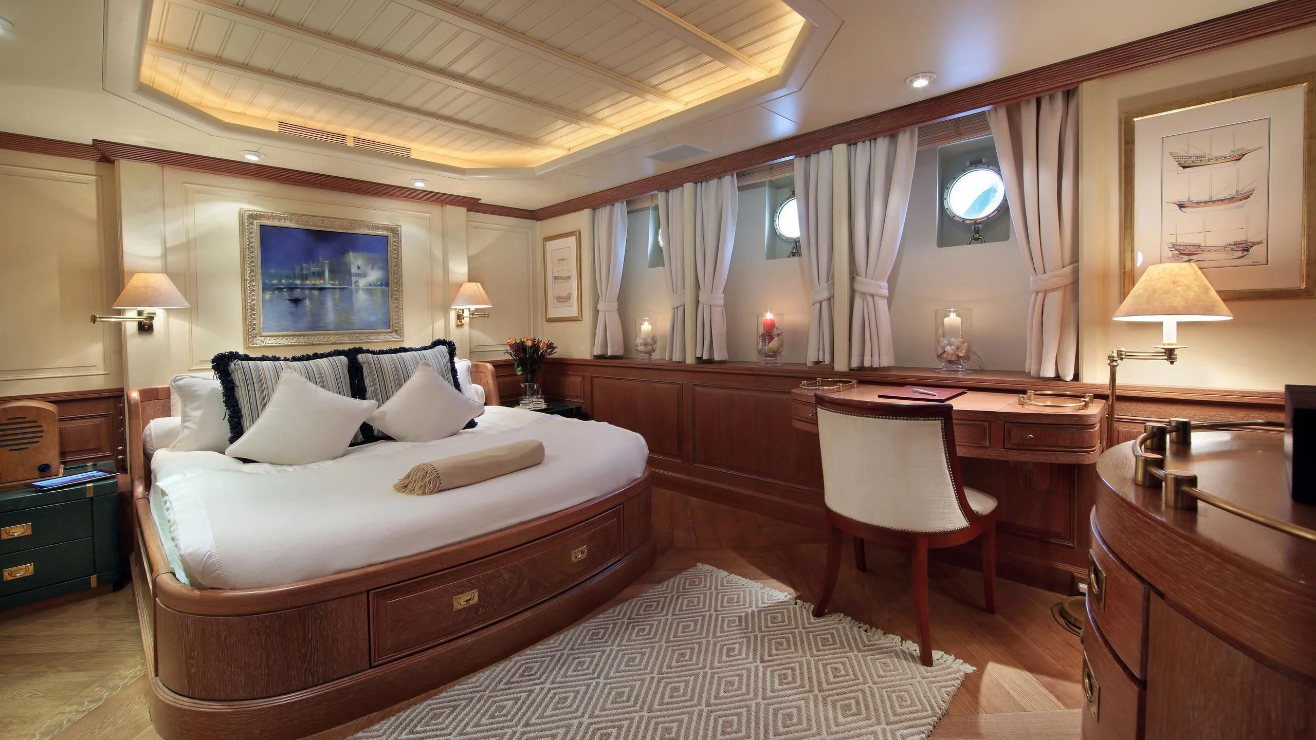 a hotel room with a bed and desk aboard GLACIAL BEAR Yacht for Sale