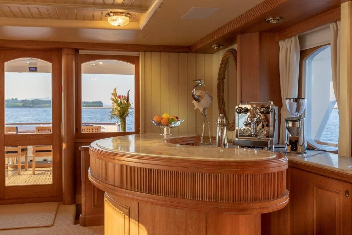 a kitchen with a sink and a large window aboard GLACIAL BEAR Yacht for Sale