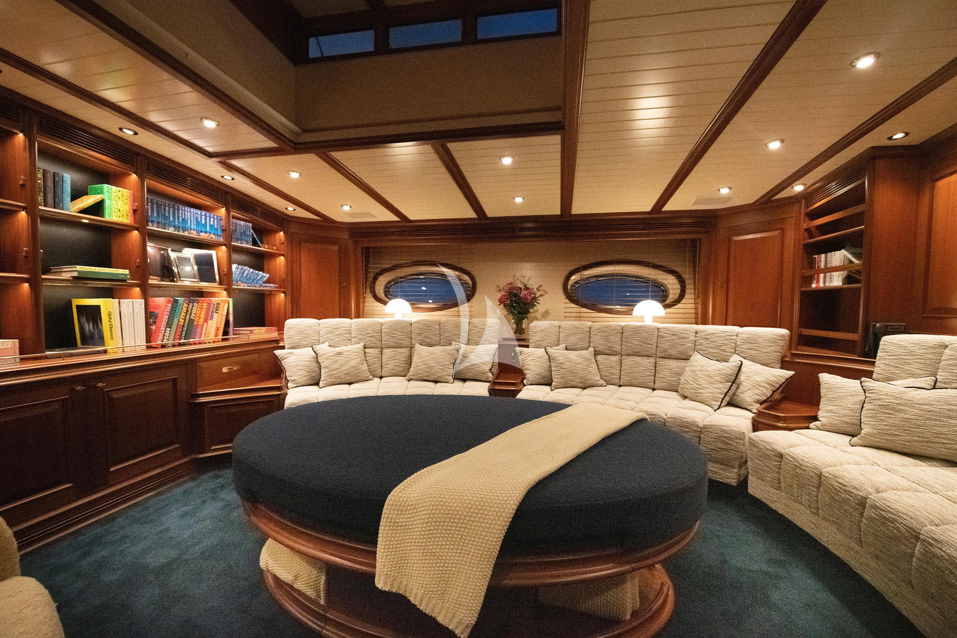 a large bed in a room aboard ATHOS Yacht for Sale