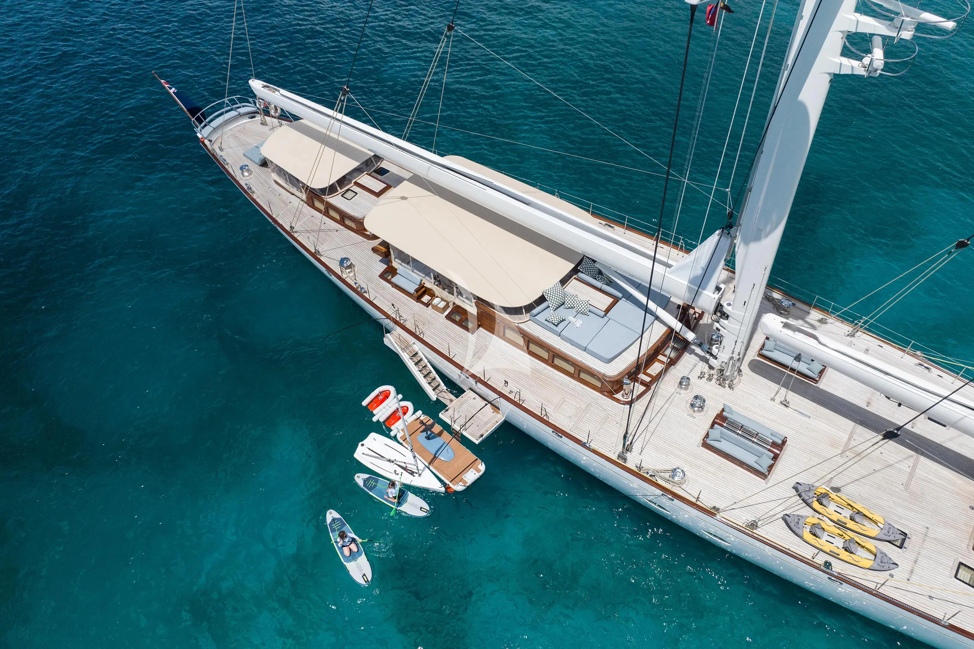 a large ship in the water aboard ATHOS Yacht for Sale