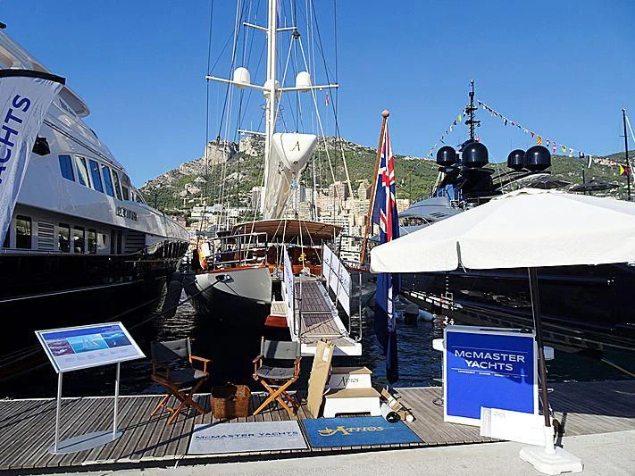 a boat docked at a pier aboard ATHOS Yacht for Sale