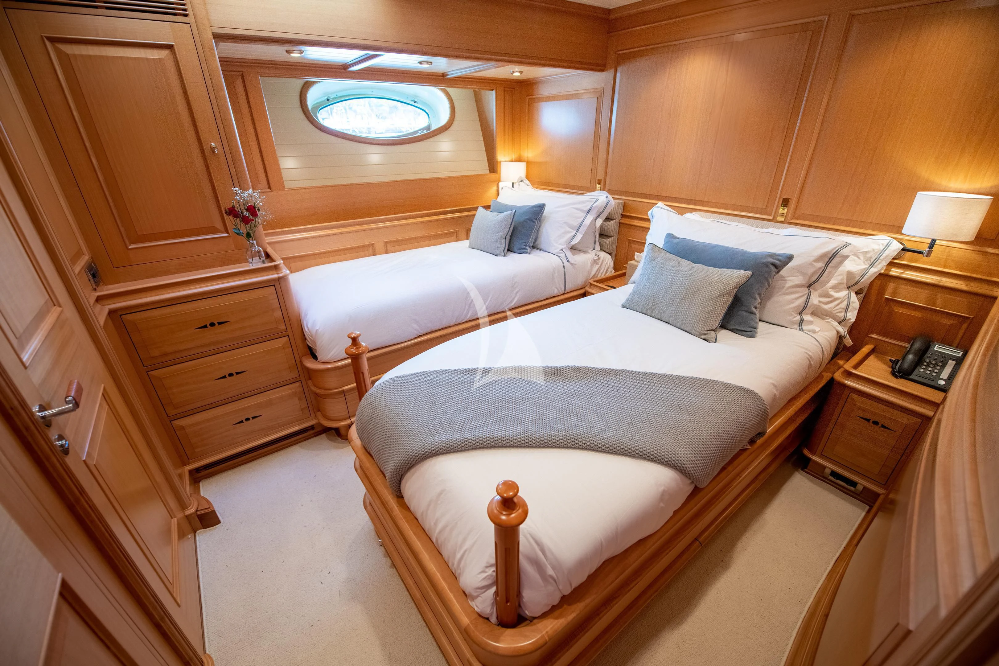 a room with two beds aboard ATHOS Yacht for Sale