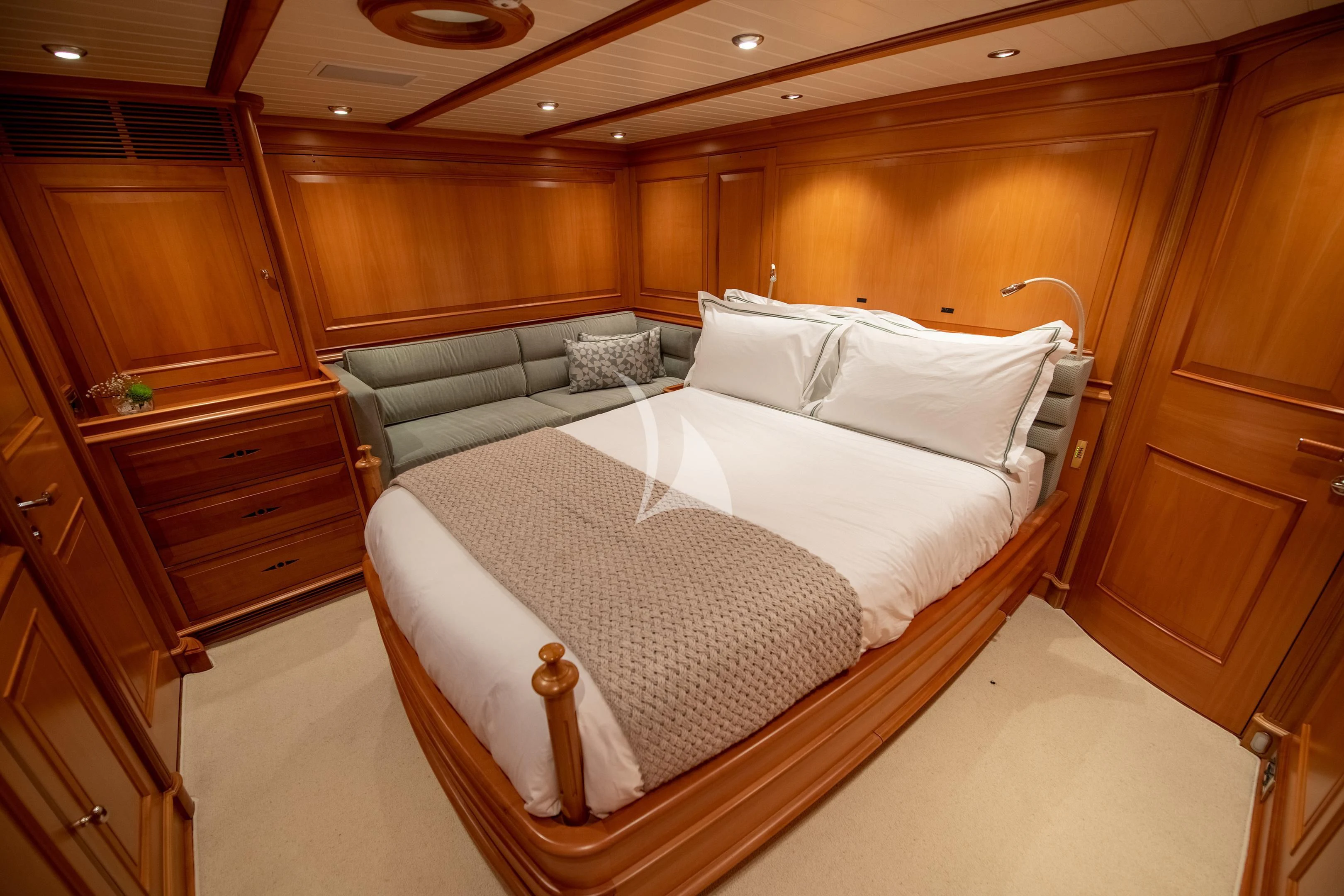 a bed in a room aboard ATHOS Yacht for Sale