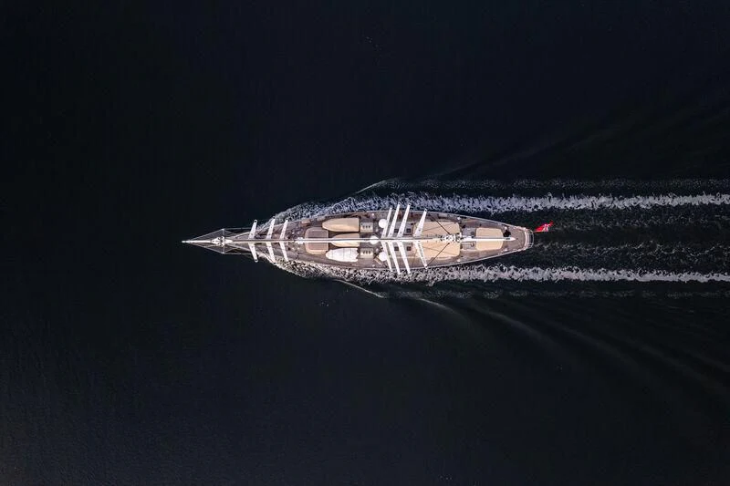a rocket taking off from the ground aboard ATHOS Yacht for Sale
