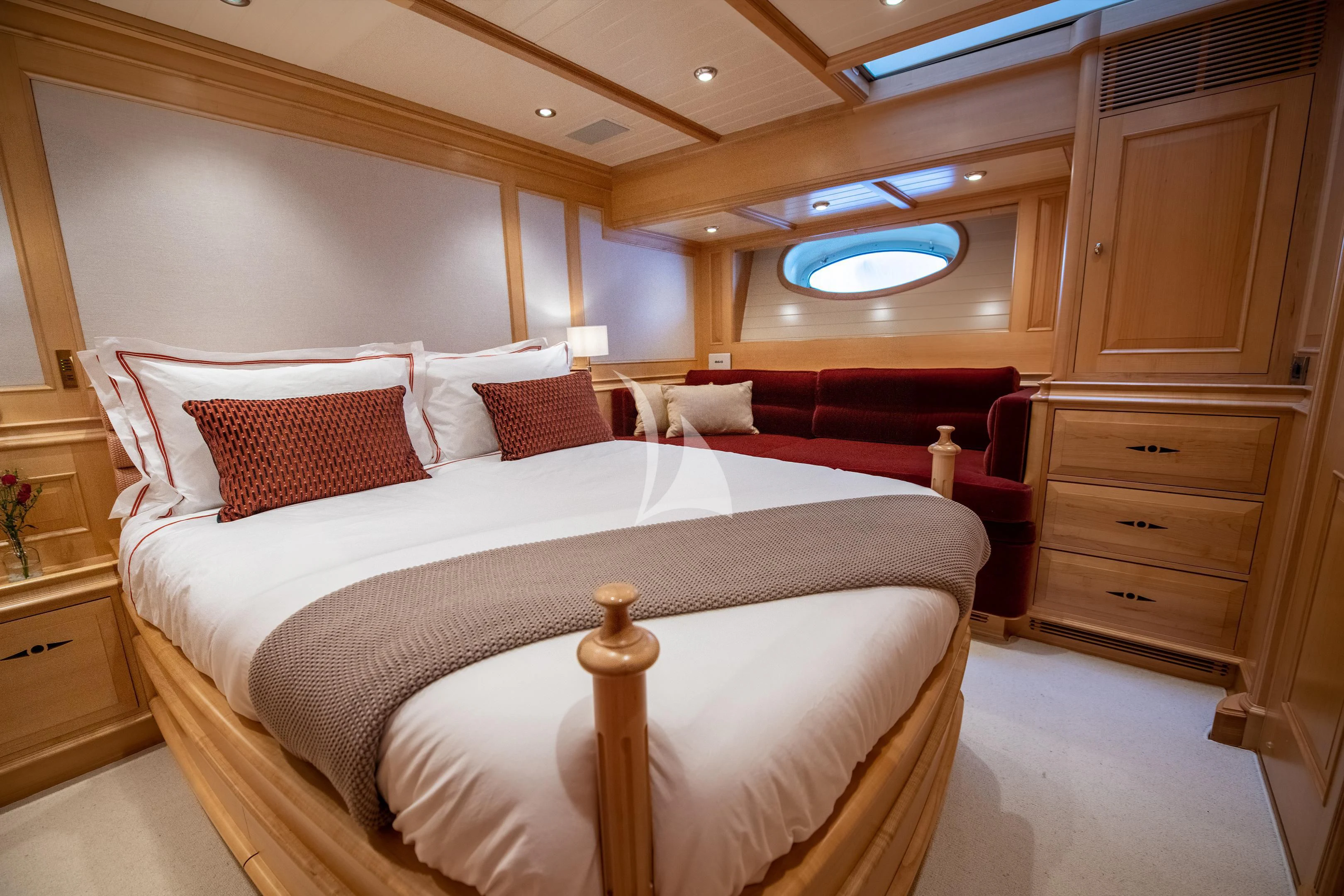 a bed in a room aboard ATHOS Yacht for Sale