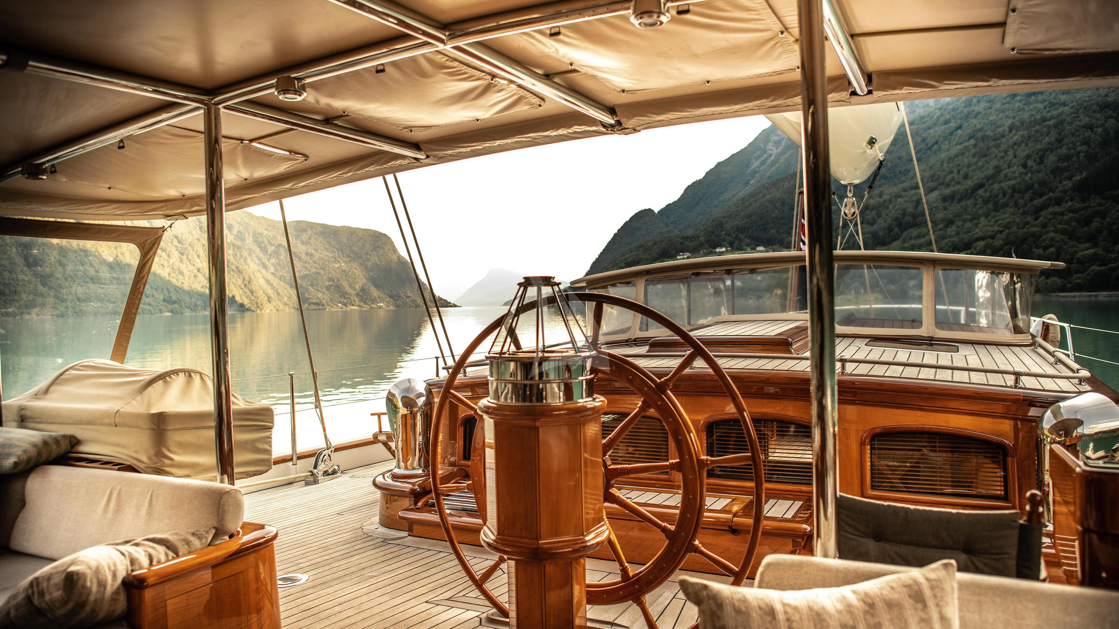 a boat on a lake aboard ATHOS Yacht for Sale
