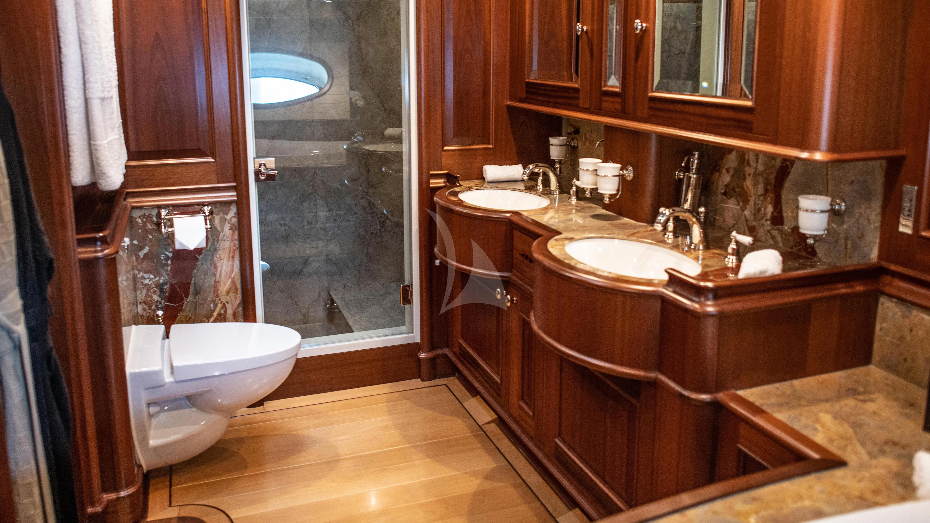 a bathroom with two sinks aboard ATHOS Yacht for Sale