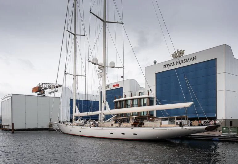 a large white boat in the water aboard ATHOS Yacht for Sale