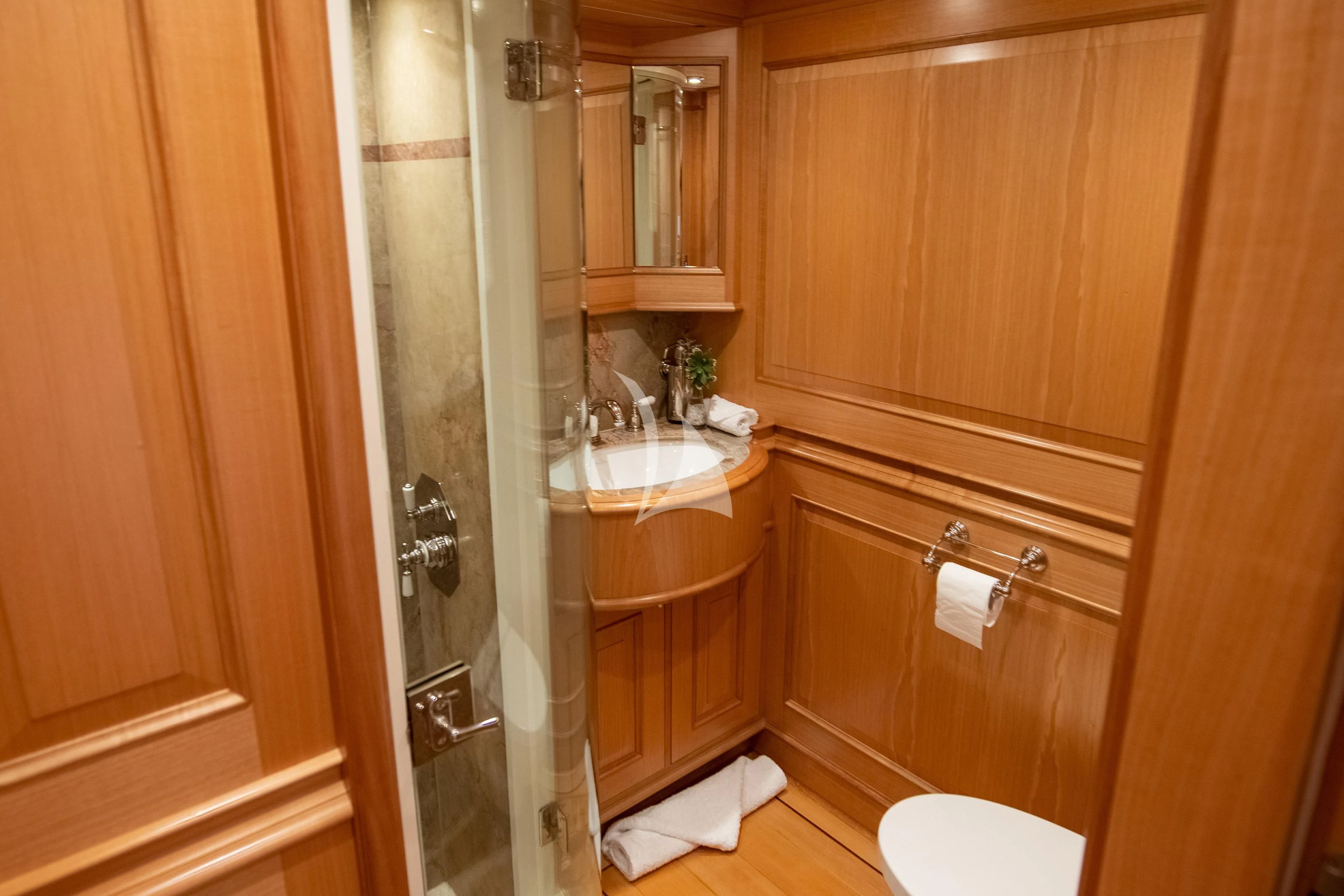 a bathroom with a sink and toilet aboard ATHOS Yacht for Sale