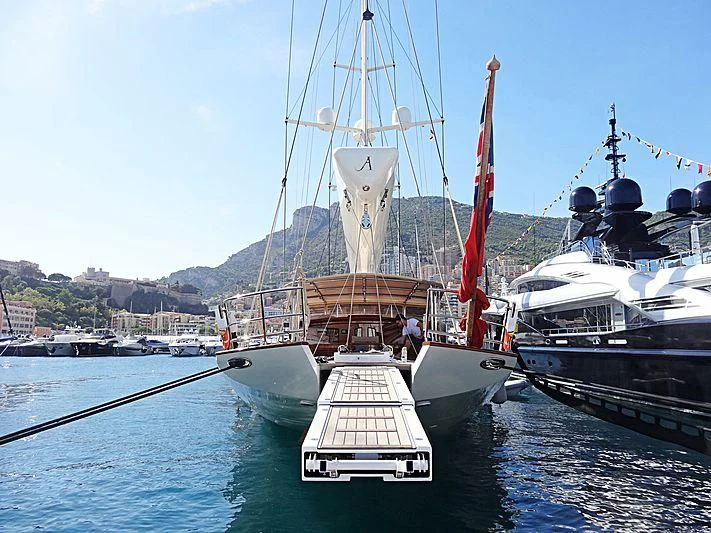 a boat docked at a pier aboard ATHOS Yacht for Sale