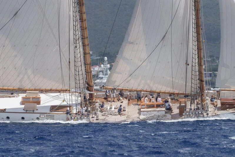 a group of people sailing on a boat aboard ATHOS Yacht for Sale