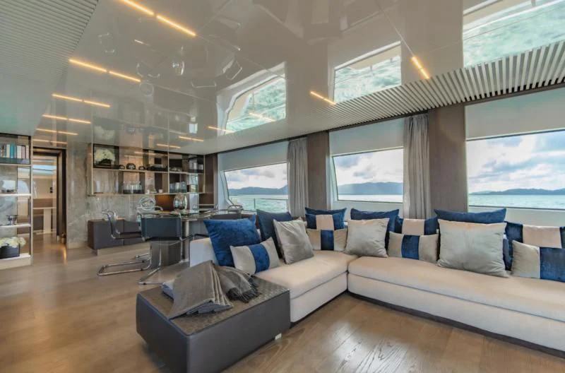 a large living room with a large window aboard ORIANT Yacht for Sale