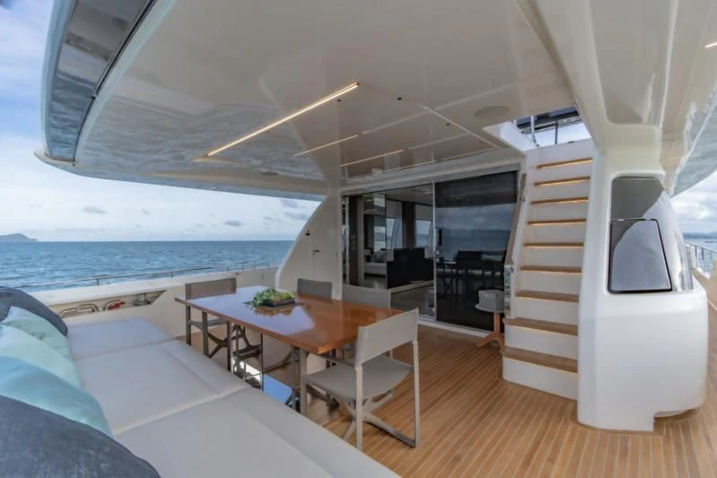 a boat with a table and chairs aboard ORIANT Yacht for Sale