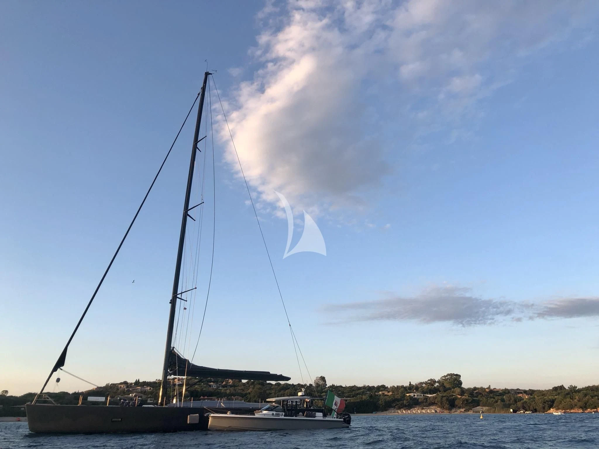 a sailboat on the water aboard AORI Yacht for Sale