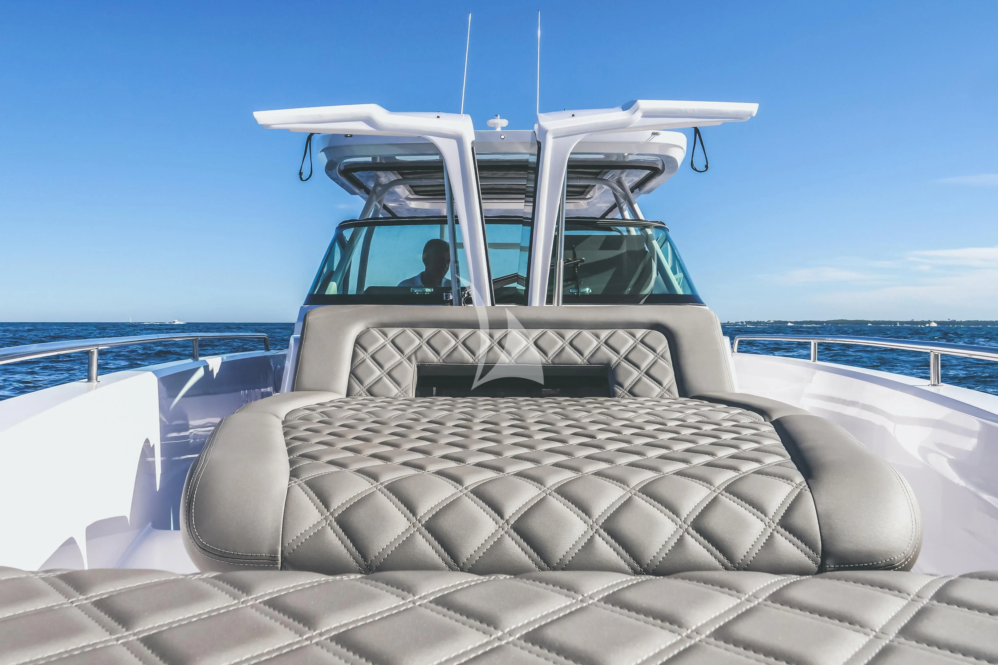 a white car with a roof aboard AORI Yacht for Sale