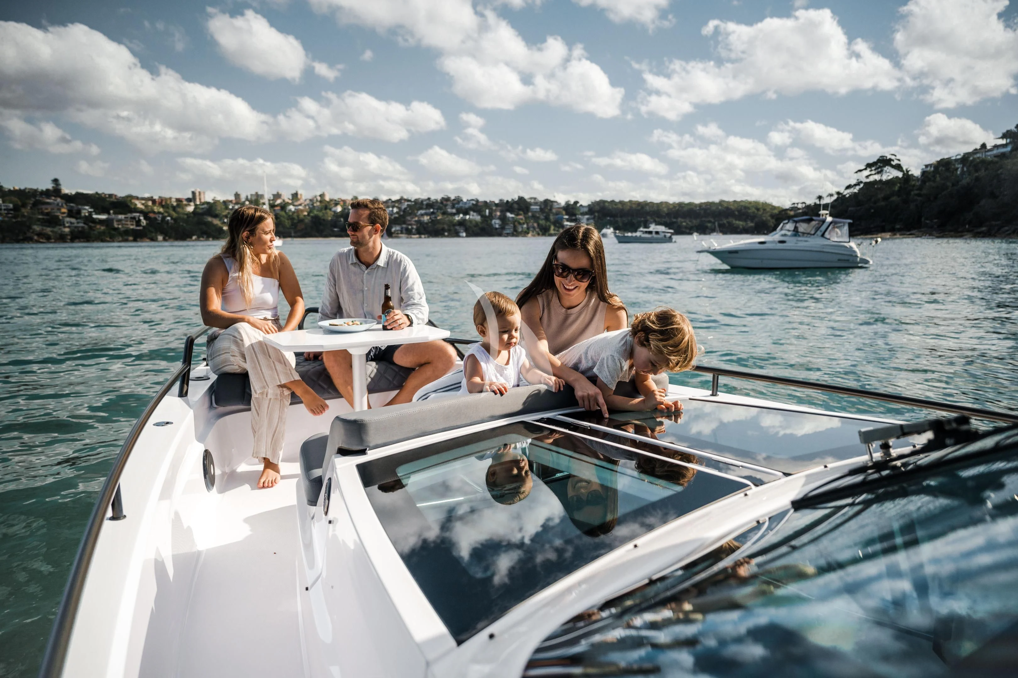 a group of people on a boat aboard AORI Yacht for Sale