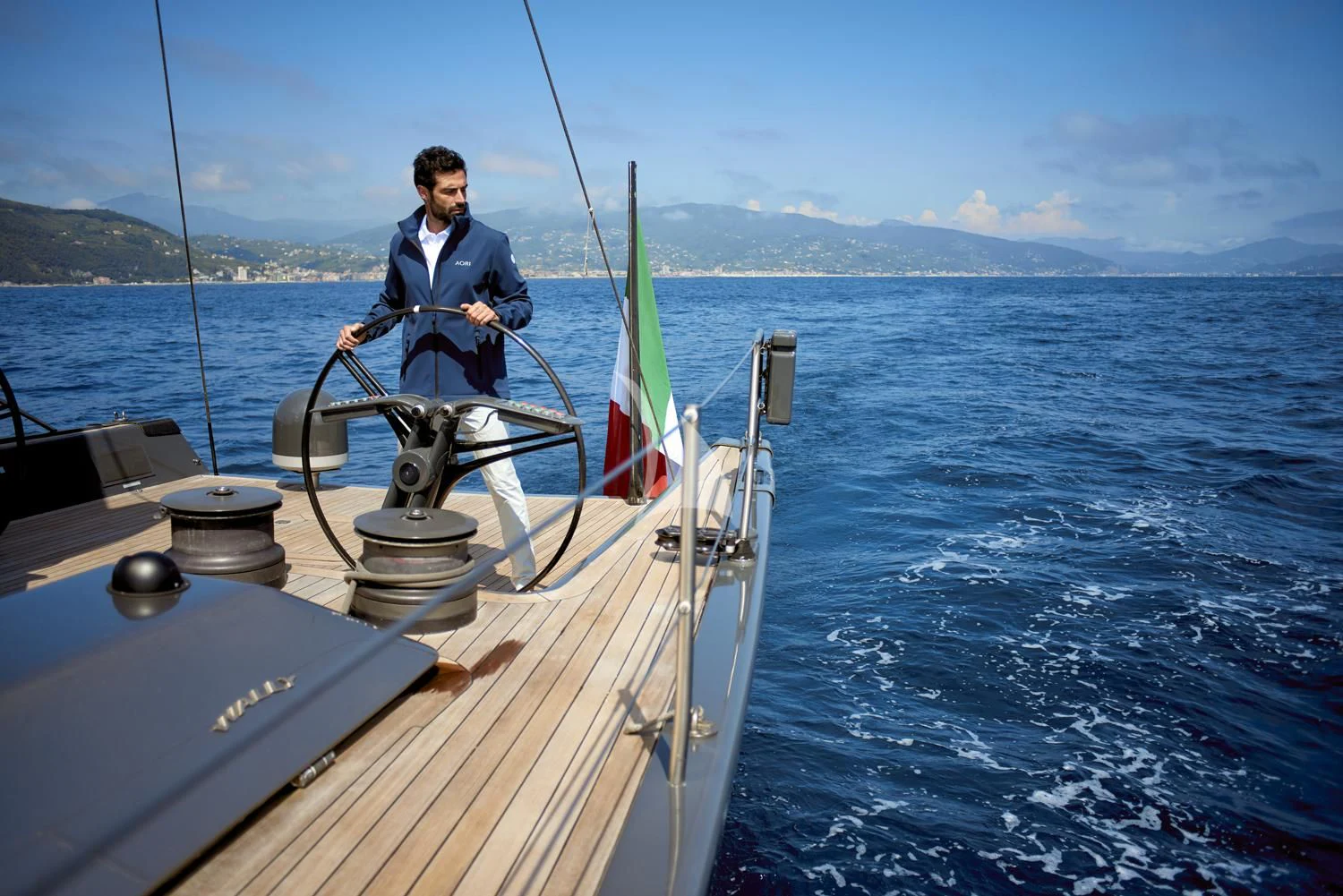 a man on a boat aboard AORI Yacht for Sale