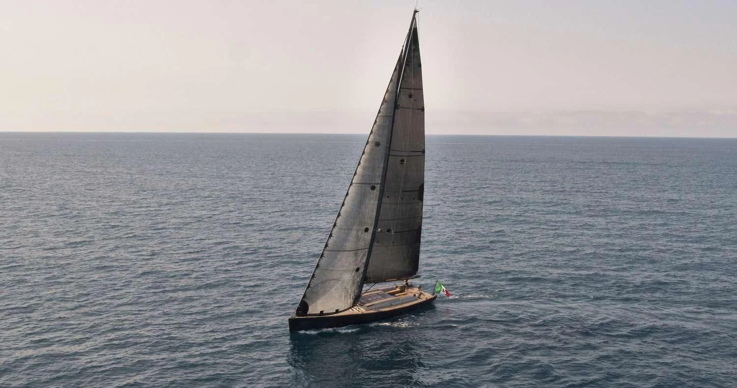 a sailboat in the water aboard AORI Yacht for Sale