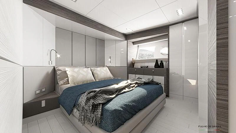 a bed in a room aboard REBELOTT Yacht for Sale
