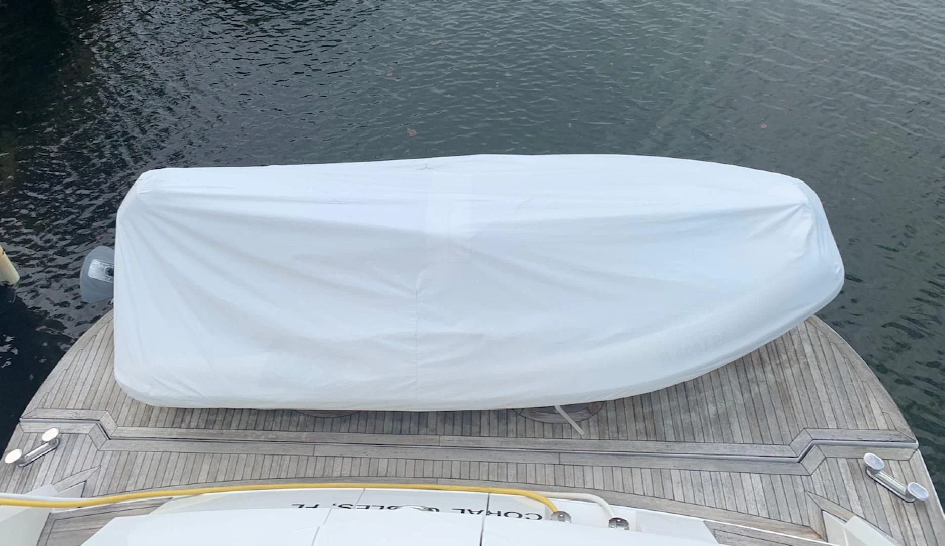 a white rectangular object on a wooden surface aboard QUEEN MARA Yacht for Sale