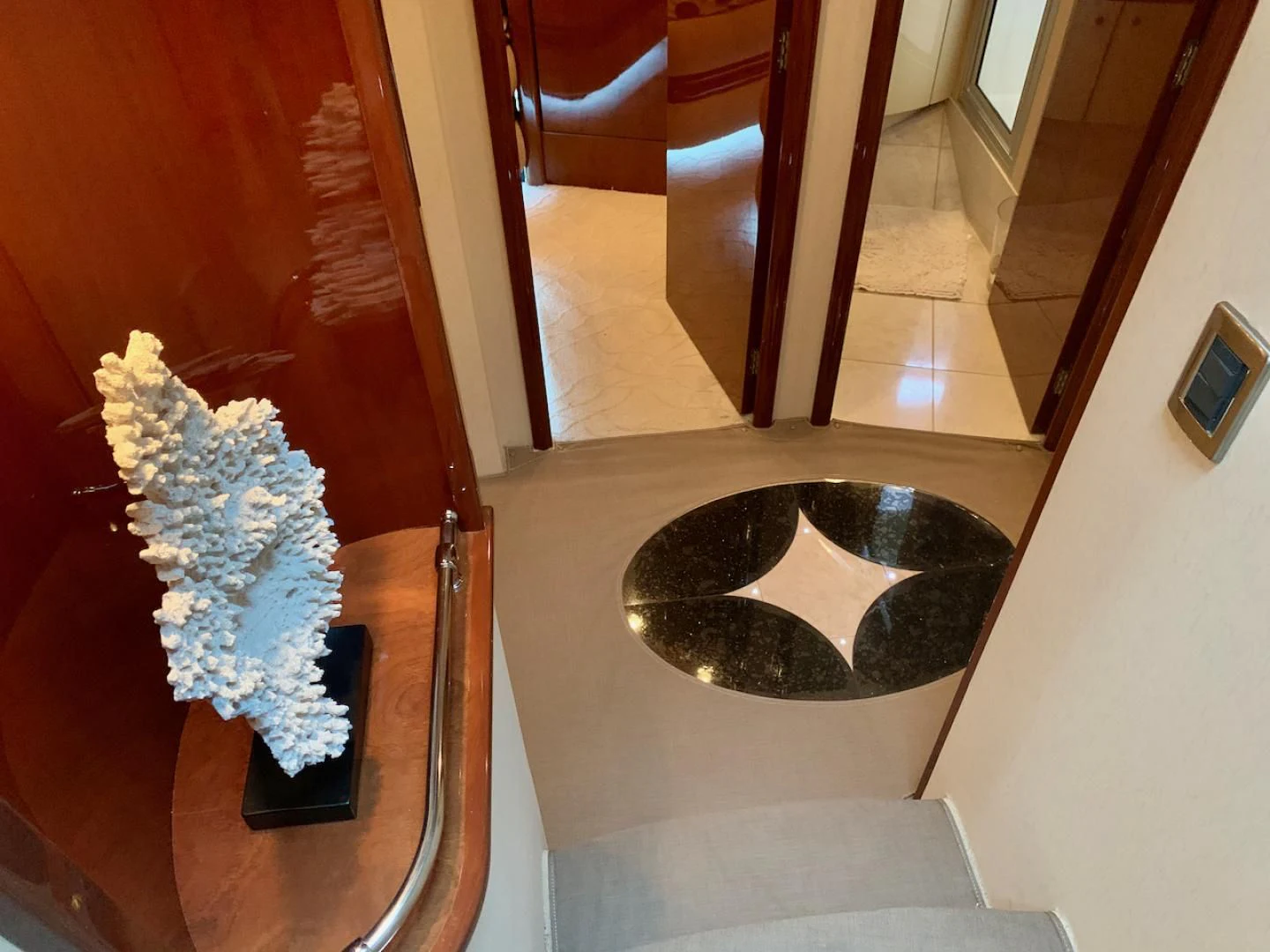 a bathroom with a sink and a mirror aboard QUEEN MARA Yacht for Sale