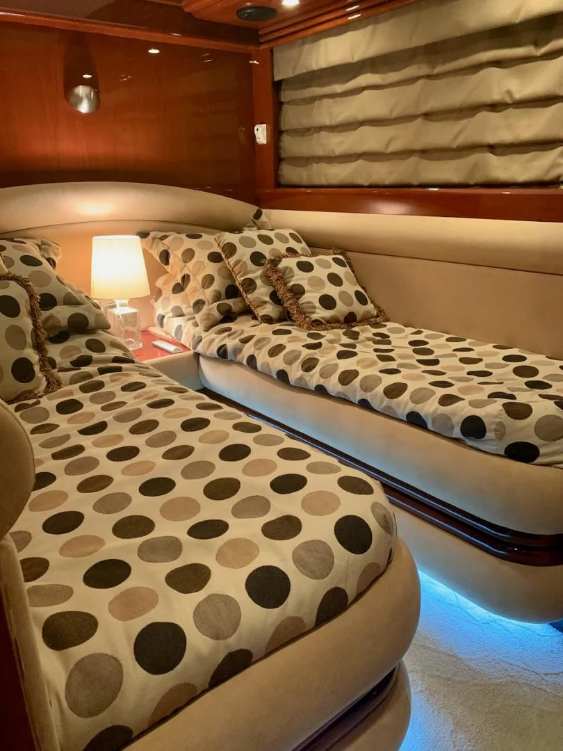 a couple of beds in a room aboard QUEEN MARA Yacht for Sale