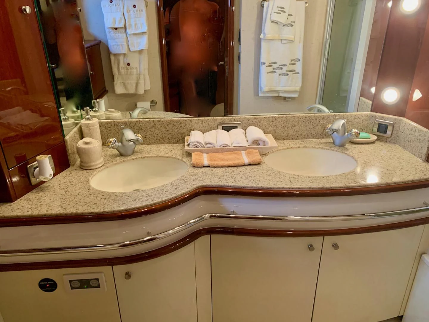 a bathroom with a countertop sink and mirror aboard QUEEN MARA Yacht for Sale
