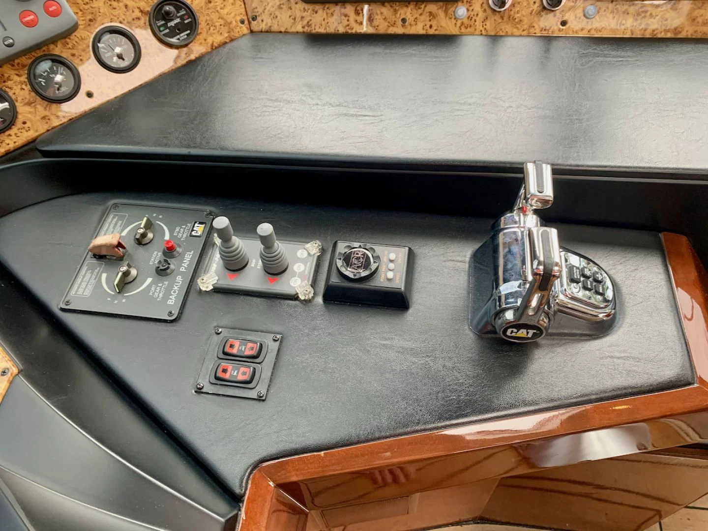 a close-up of a guitar aboard QUEEN MARA Yacht for Sale