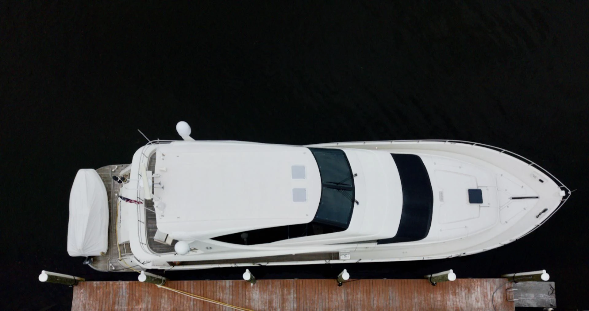 a white cylindrical object with a black background aboard QUEEN MARA Yacht for Sale