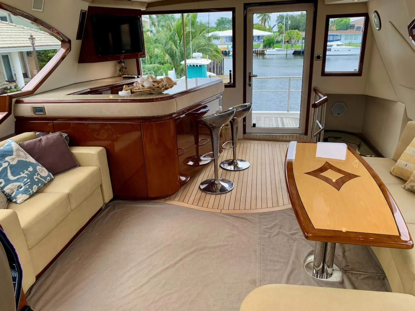 a living room with a couch and a table aboard QUEEN MARA Yacht for Sale