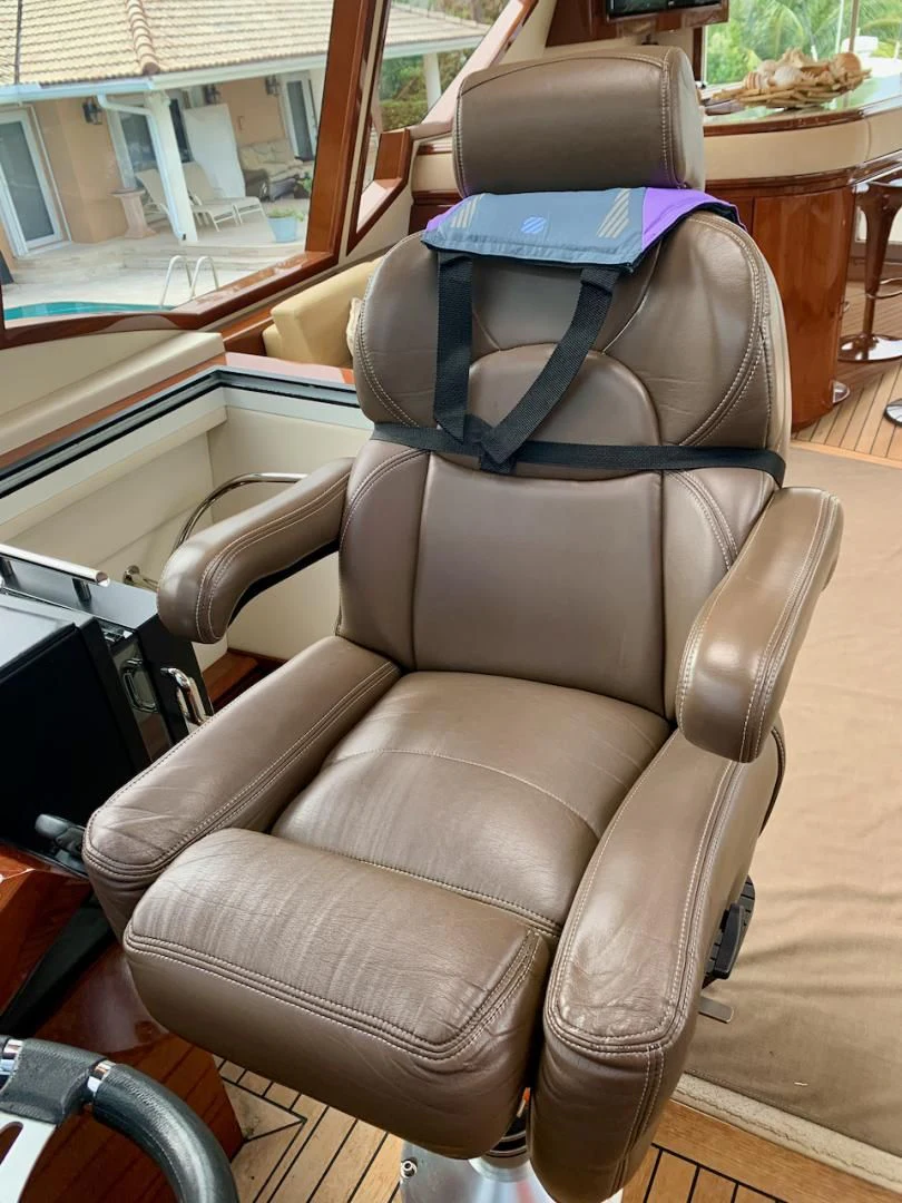 a seat with a seat belt aboard QUEEN MARA Yacht for Sale