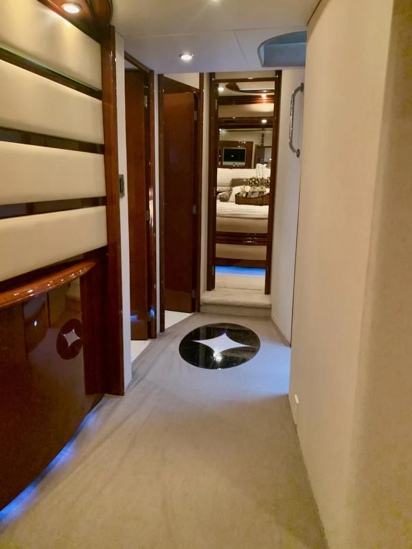 a hallway with a mirror and a sink aboard QUEEN MARA Yacht for Sale