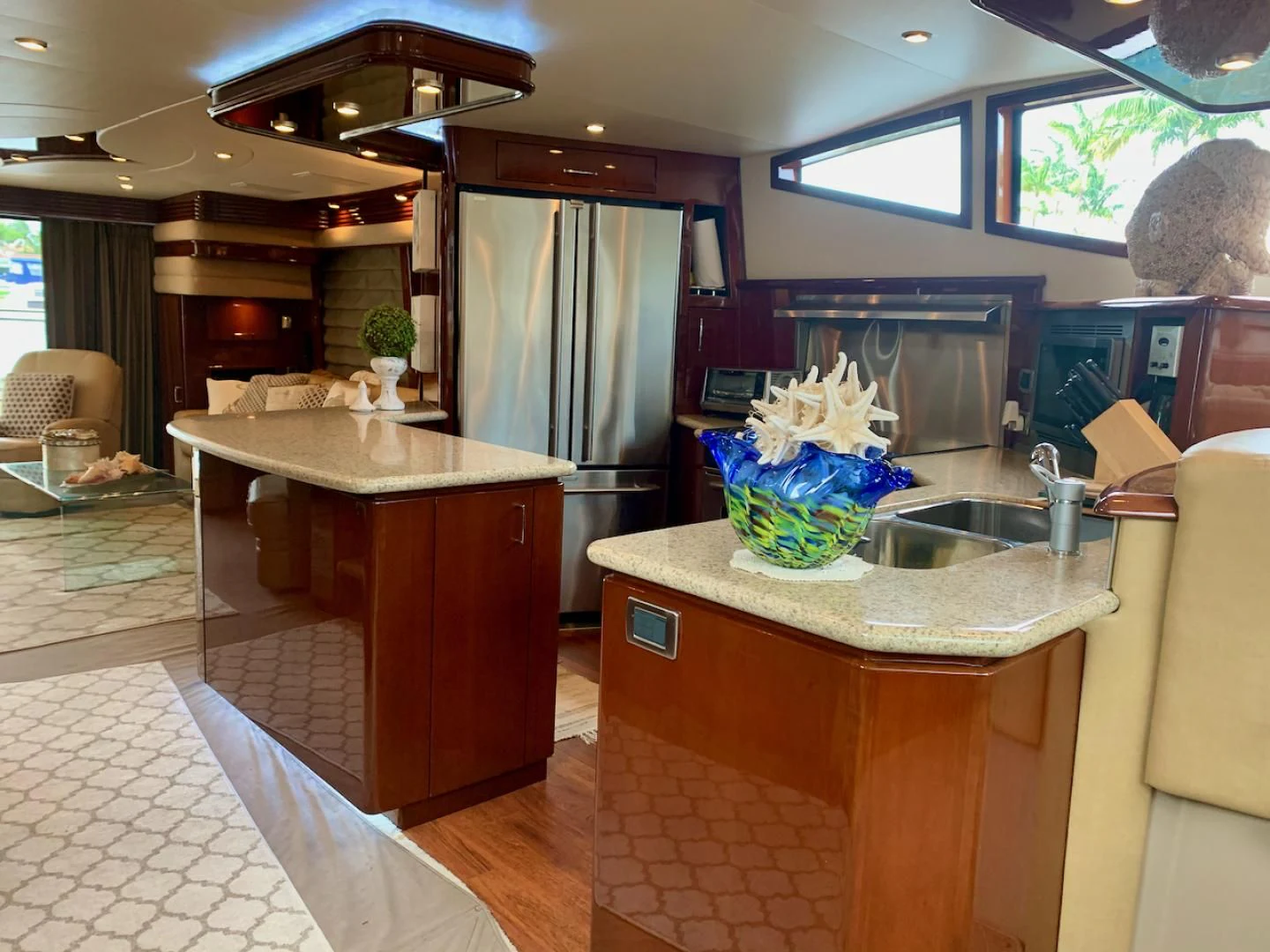 a kitchen with a sink and cabinets aboard QUEEN MARA Yacht for Sale