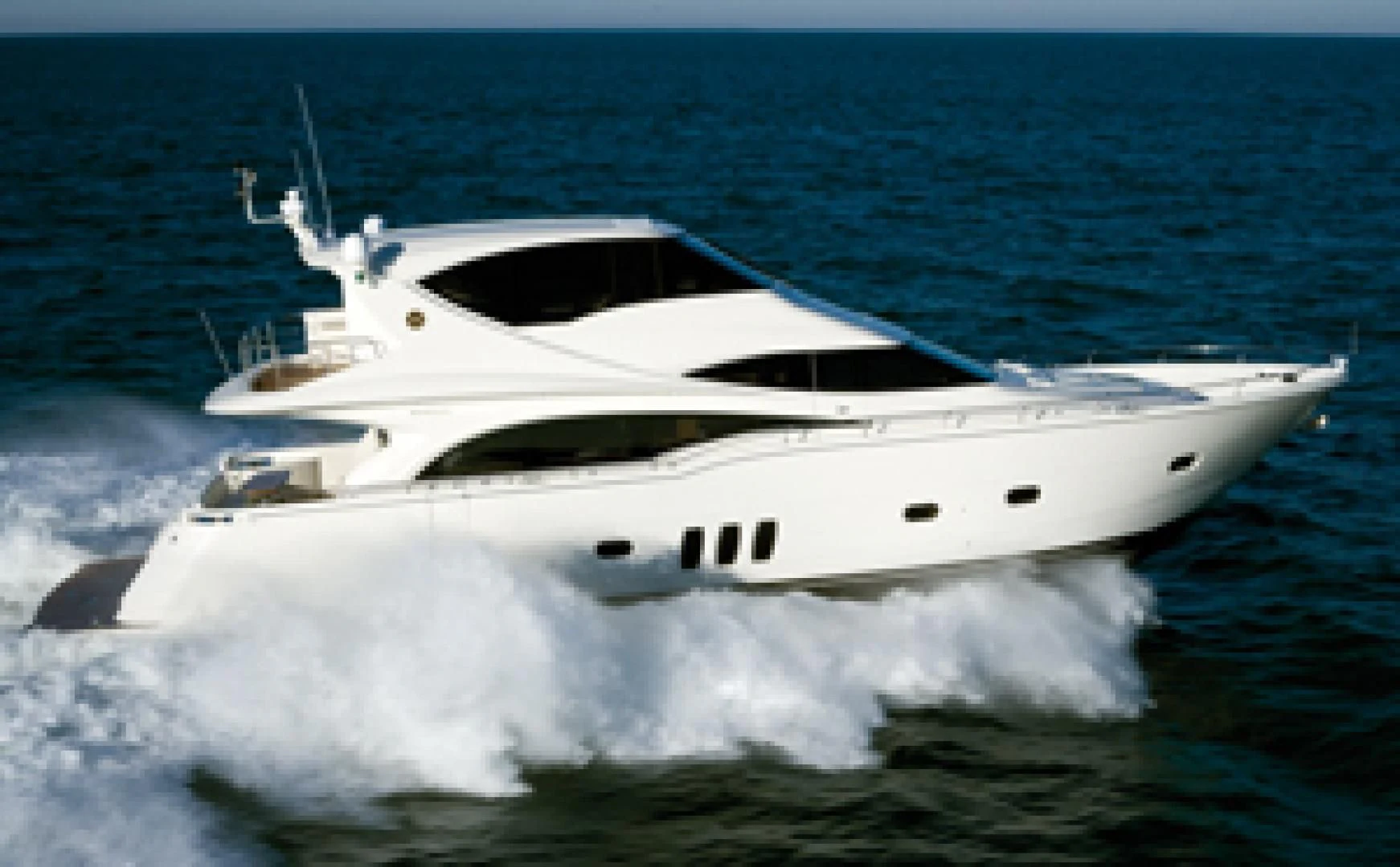 a white yacht in the water aboard QUEEN MARA Yacht for Sale