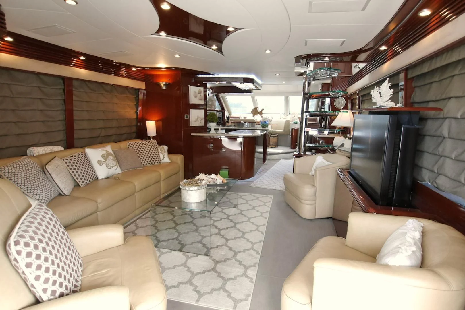 a living room with a fireplace aboard QUEEN MARA Yacht for Sale