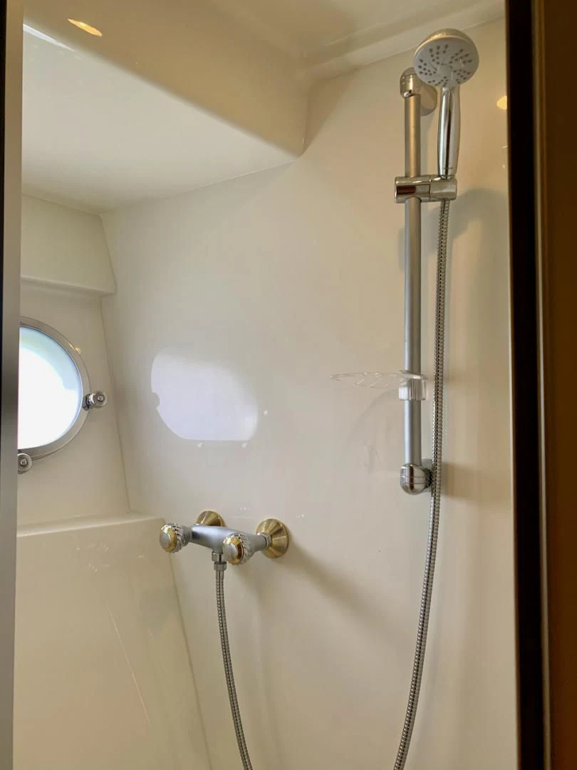 a shower with a glass door aboard QUEEN MARA Yacht for Sale