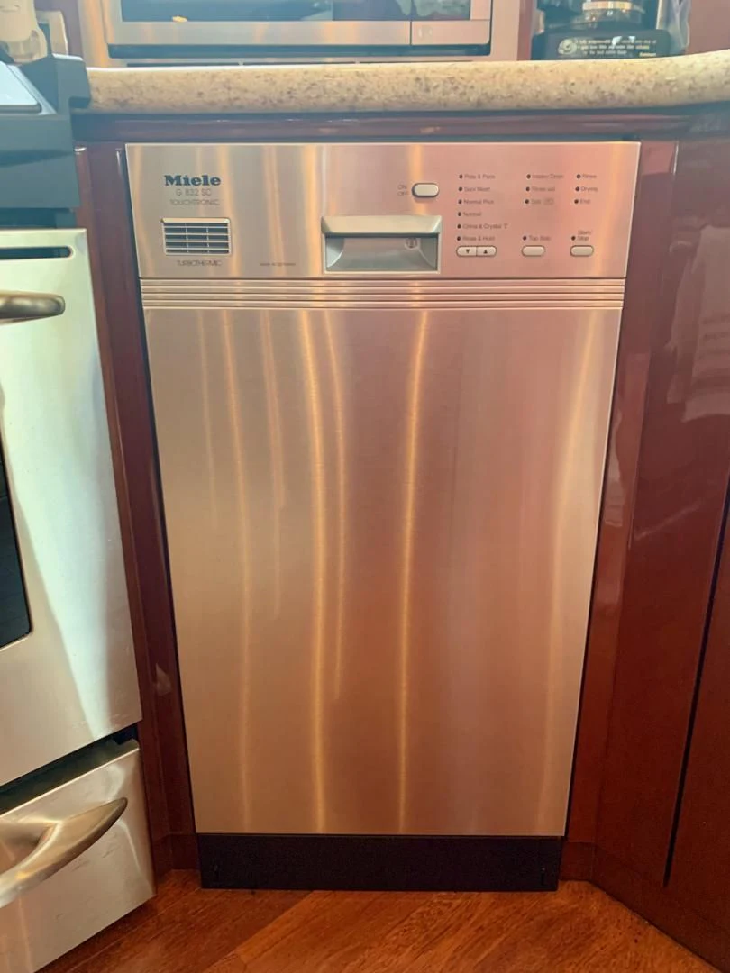 a large refrigerator in a kitchen aboard QUEEN MARA Yacht for Sale