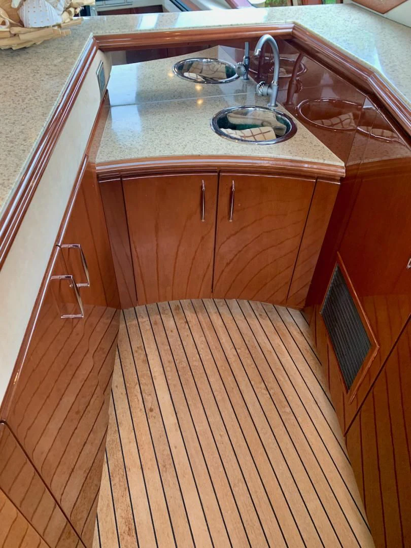 a kitchen with a sink and a stove aboard QUEEN MARA Yacht for Sale