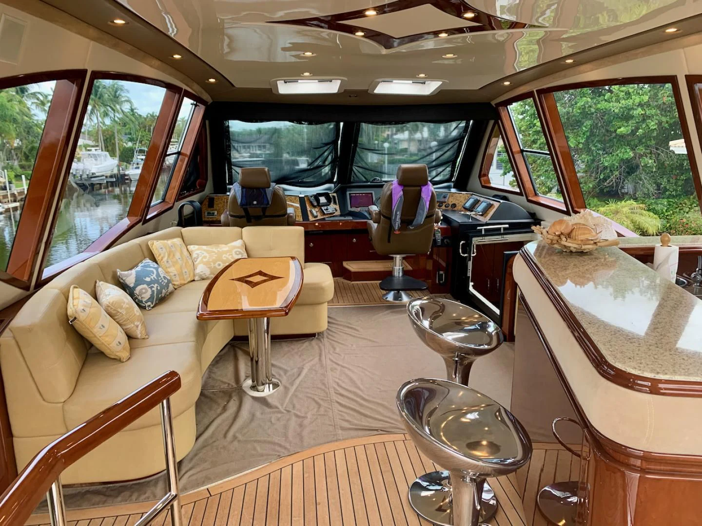 a living room with a couch and chairs aboard QUEEN MARA Yacht for Sale