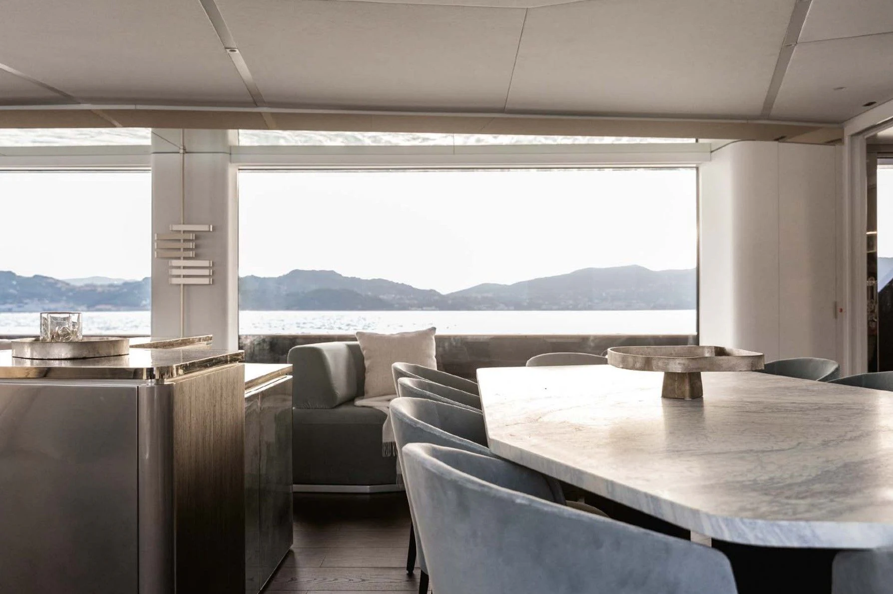 a room with a table and chairs aboard AZIMUT MAGELLANO 30 Yacht for Sale