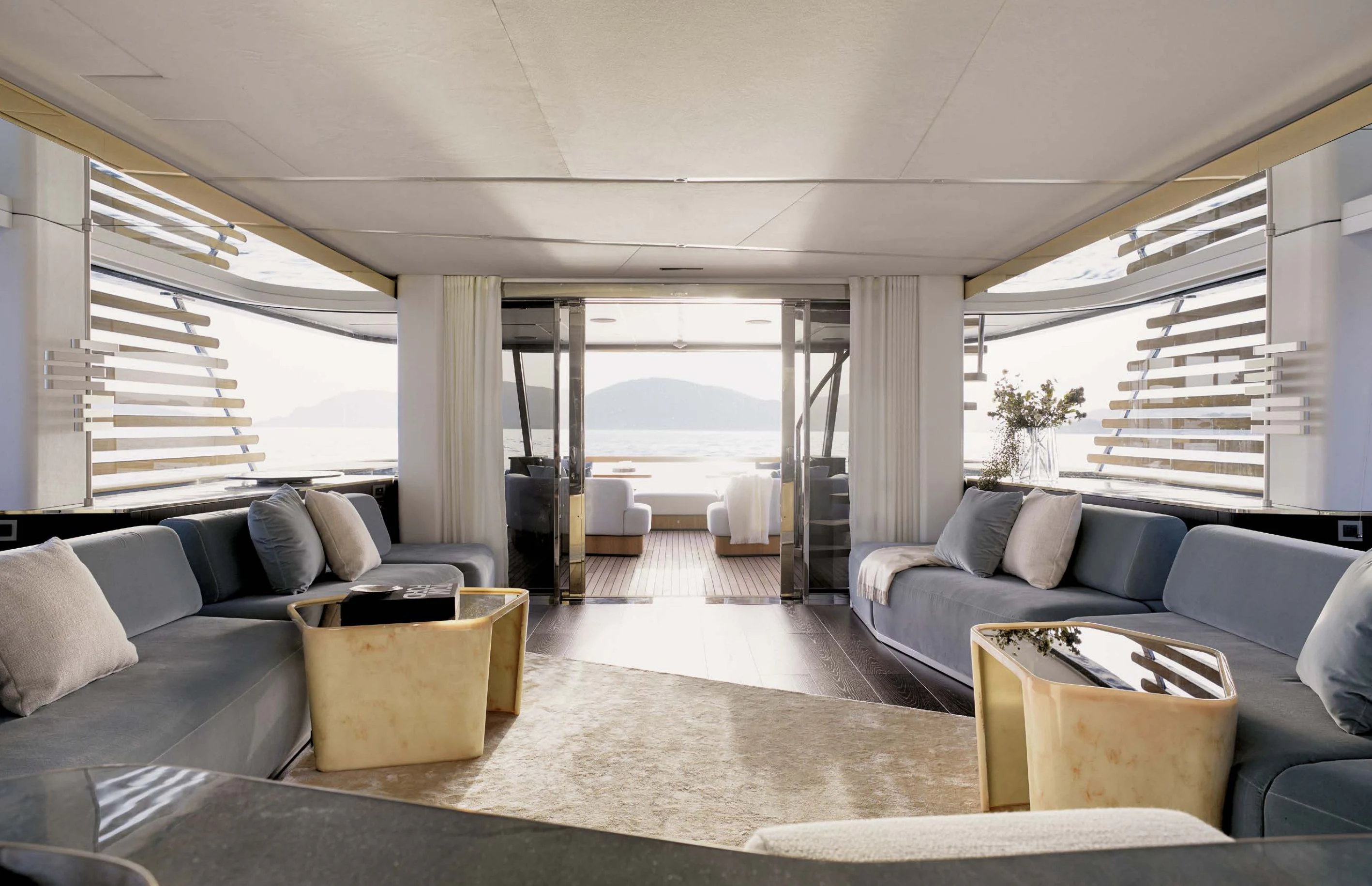 a living room with a large window aboard AZIMUT MAGELLANO 30 Yacht for Sale