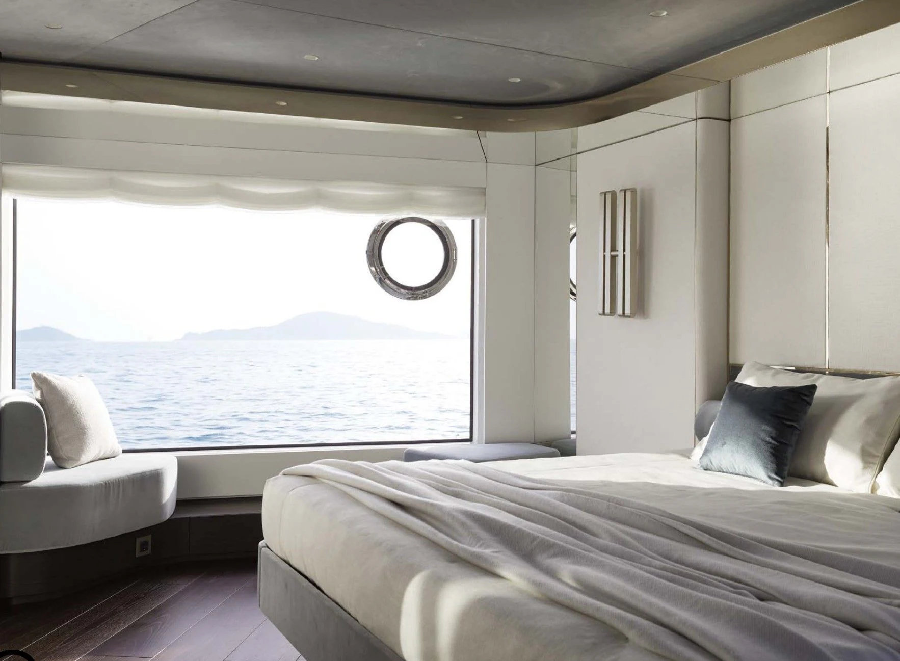 a bedroom with a large bed aboard AZIMUT MAGELLANO 30 Yacht for Sale