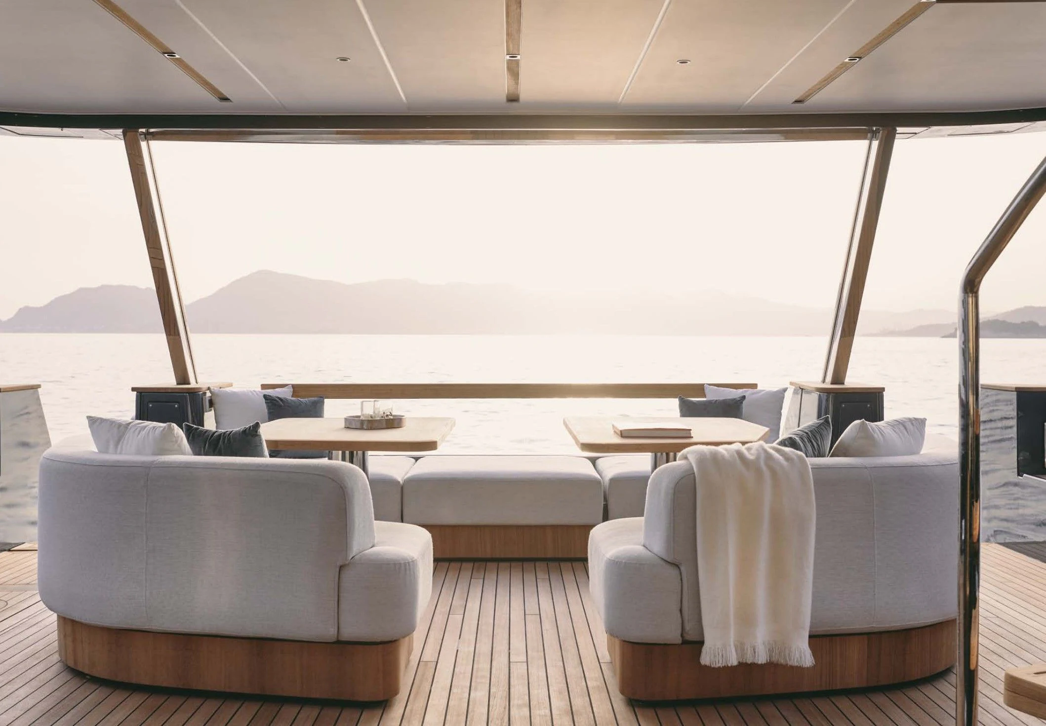 a room with a couch and a table aboard AZIMUT MAGELLANO 30 Yacht for Sale