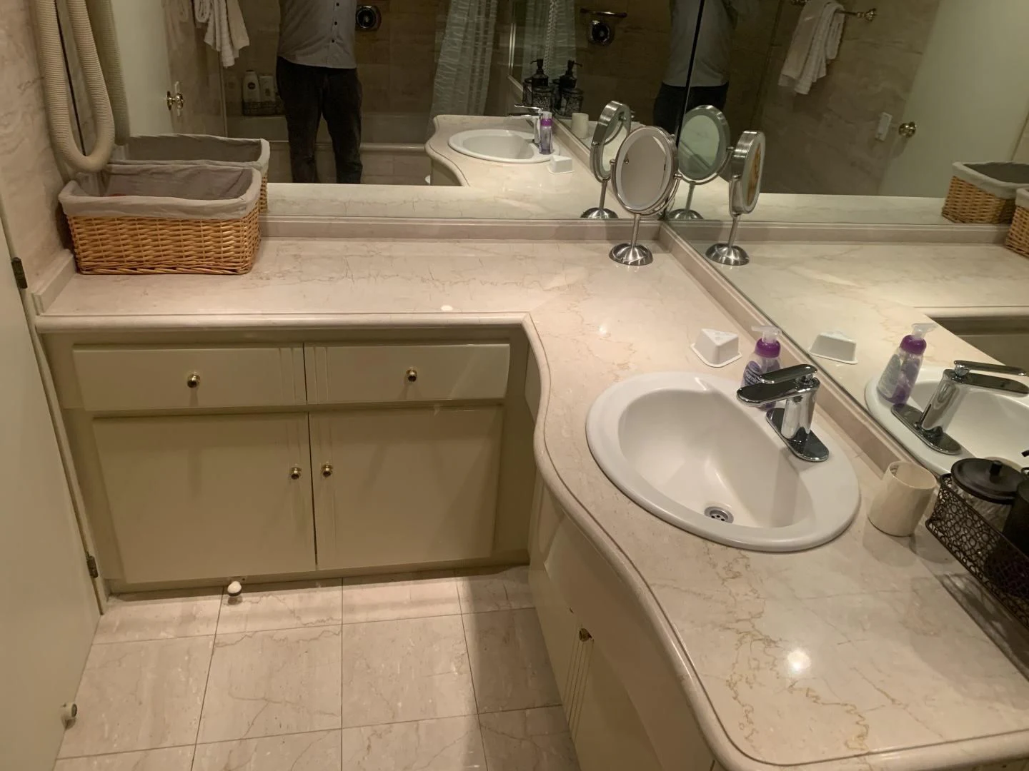 a bathroom with a large mirror aboard REHAB Yacht for Sale