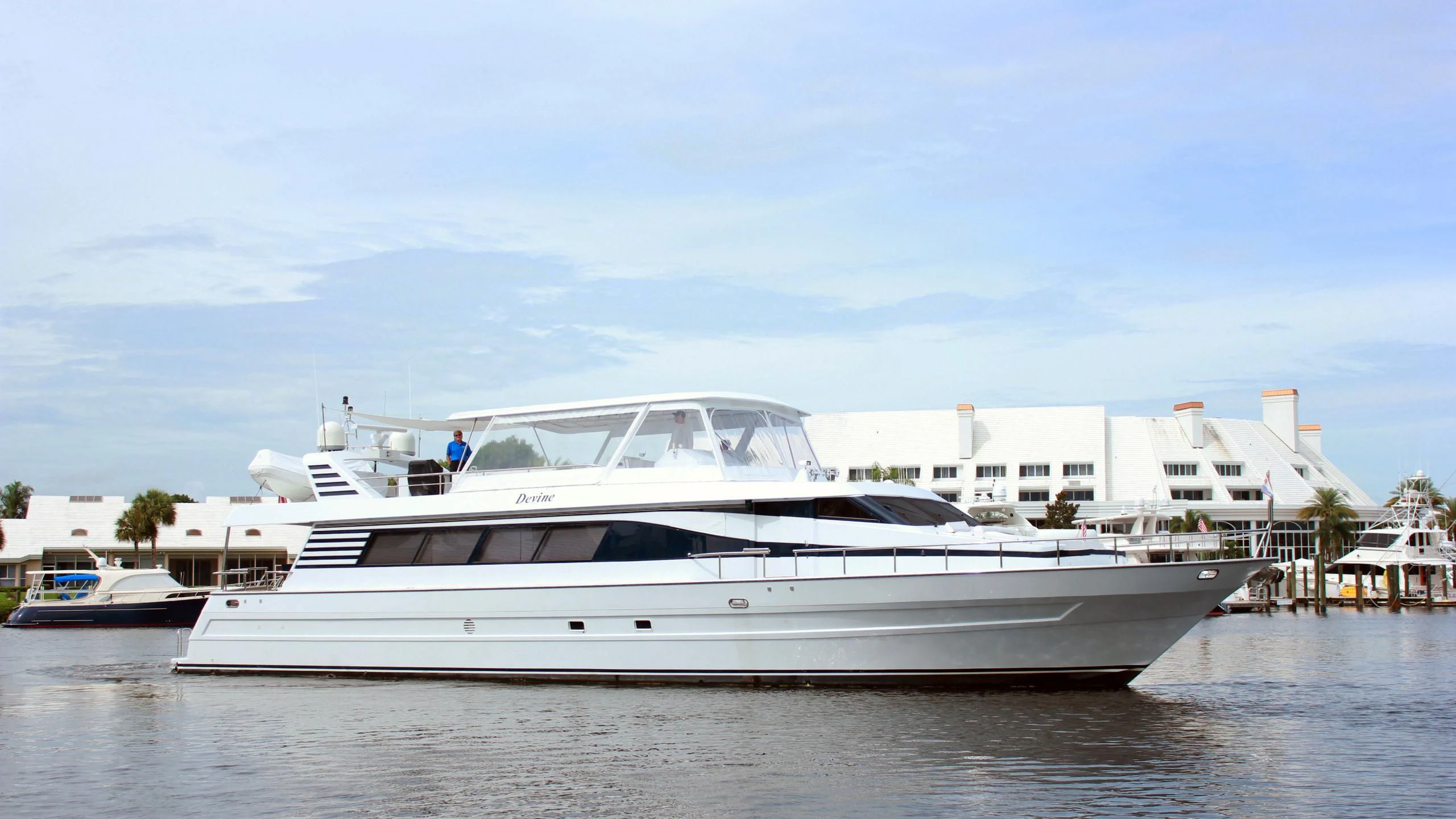a white yacht in the water aboard REHAB Yacht for Sale