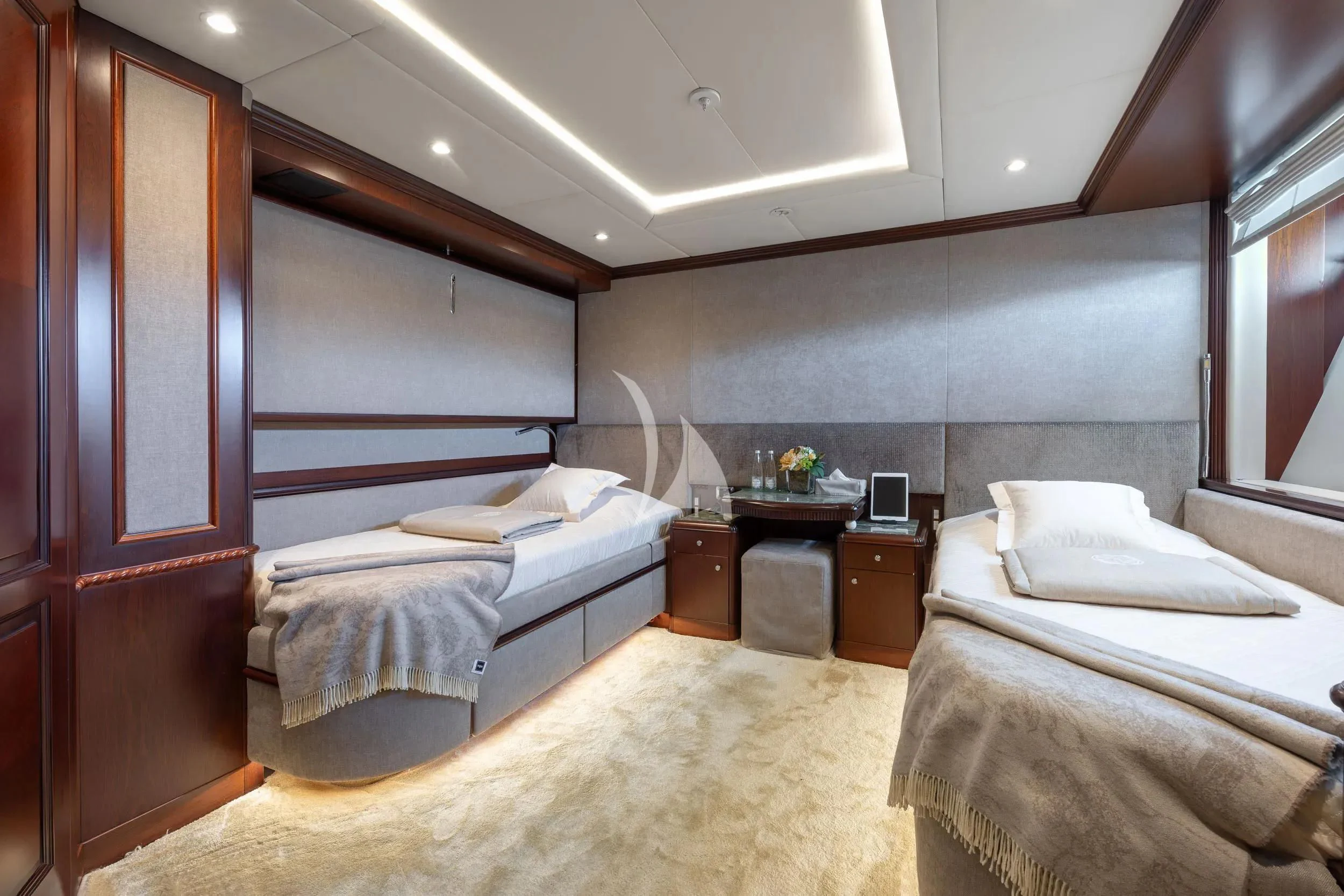 a room with two beds aboard AKIRA ONE Yacht for Charter