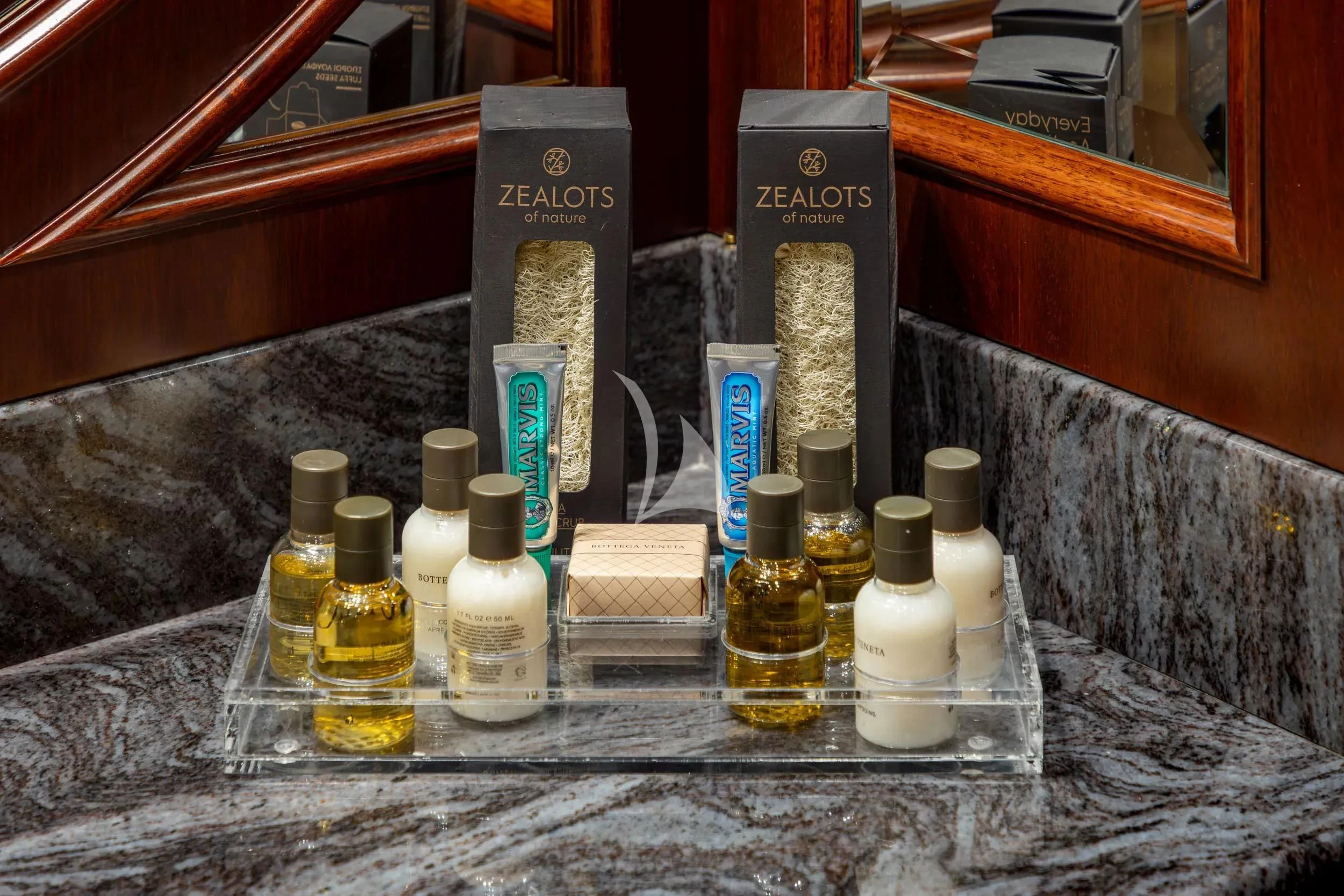 a group of bottles on a table aboard AKIRA ONE Yacht for Charter