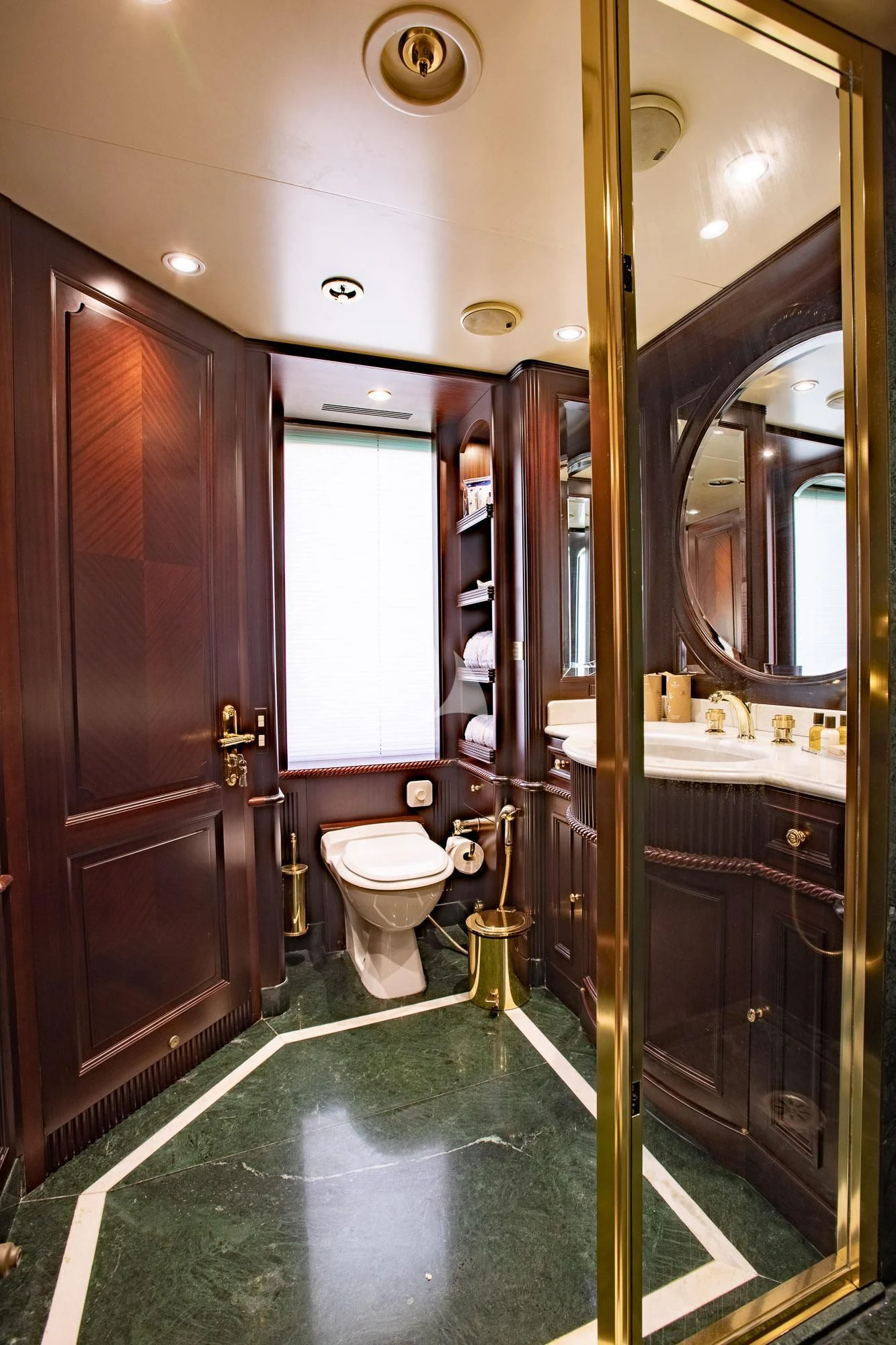 a bathroom with a glass shower aboard AKIRA ONE Yacht for Charter