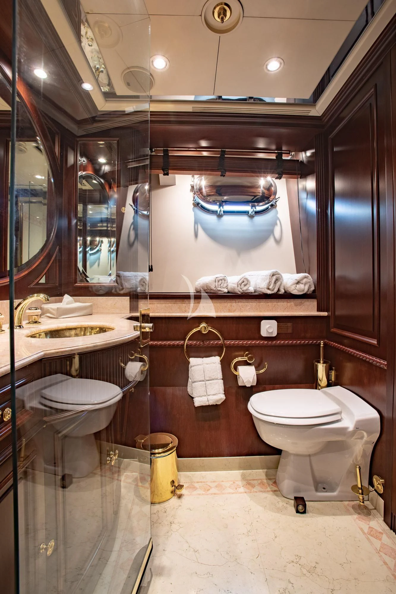 a bathroom with a large mirror aboard AKIRA ONE Yacht for Charter