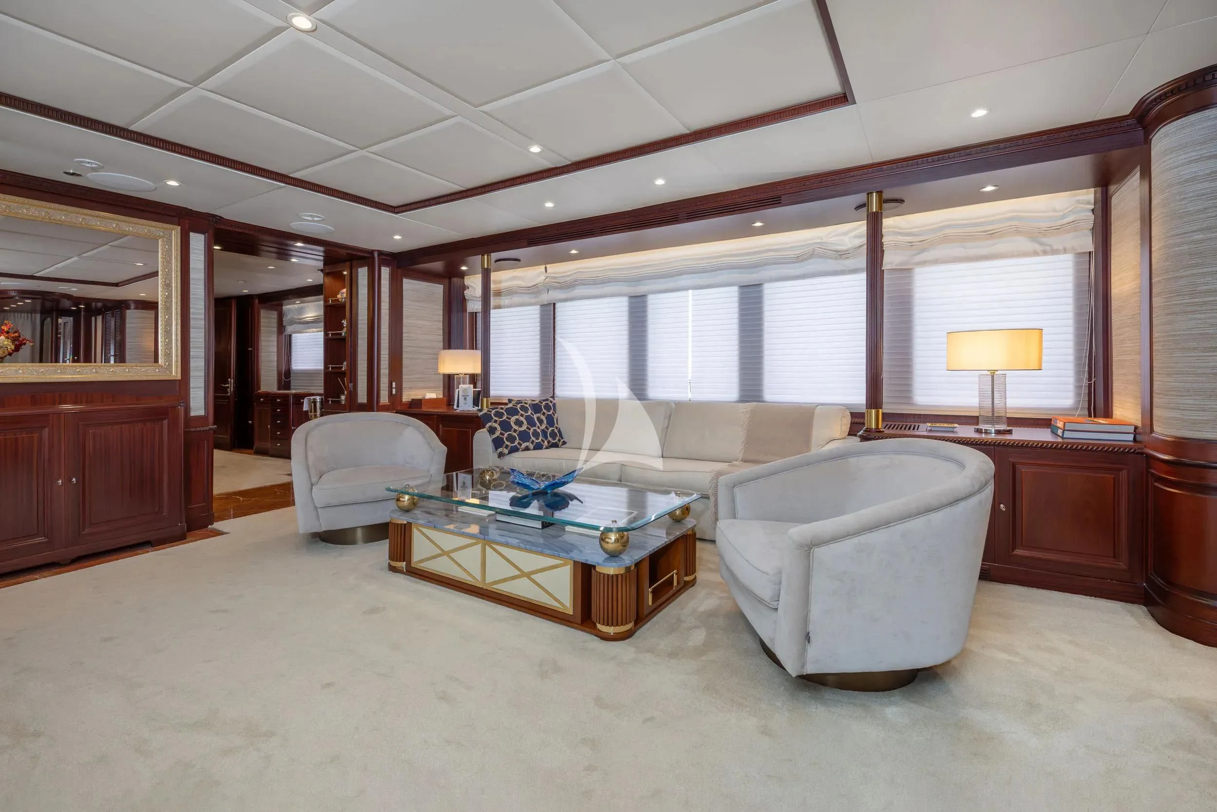 a living room with a large window aboard AKIRA ONE Yacht for Charter